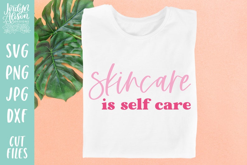 May include: White t-shirt with the text "Skincare is self care" in pink lettering. The text is in a cursive font.