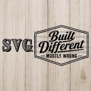 May include: Black and white SVG design on a light wood grain background. The design includes the word "SVG" in a decorative font, and the phrase "Built Different - Mostly Wrong" inside a black hexagon.