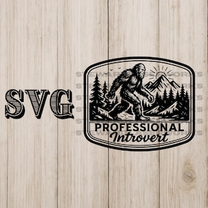 May include: Black and white SVG design featuring a Bigfoot illustration walking in front of a mountain range and trees. The text reads "PROFESSIONAL Introvert". The word "SVG" is also displayed.