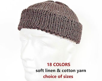 May include: A brown knit beanie with a cuffed brim, featuring a textured open-stitch pattern. The image includes the text 18 COLORS, soft linen & cotton yarn, and choice of sizes, displayed on a white mannequin head against a plain background.