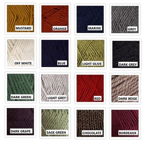 May include: A grid of sixteen square swatches displaying various yarn colors including mustard, orange, marine, grey, off white, blue, light olive, dark grey, dark green, light grey, red, dark beige, dark grape, sage green, chocolate, and bordeaux.