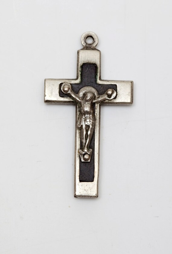 Religious Crucifix with Silver Tone Surround and B