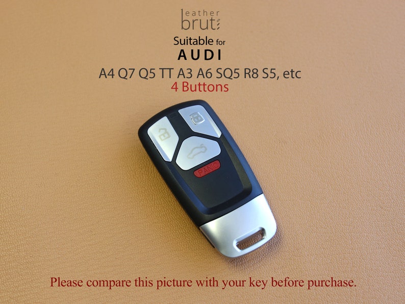 May include: Black remote car key with four buttons, labeled "Panic". Suitable for Audi A4, Q7, Q5, TT, A3, A6, SQ5, R8, S5, etc.