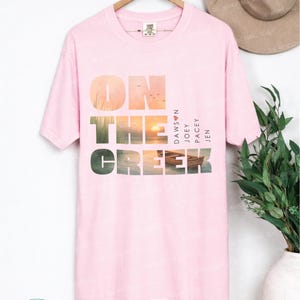 Millennial nostalgia Comfort Colors shirt with watercolor sunset landscape graphic, retro TV inspired vintage aesthetic fashion tee
