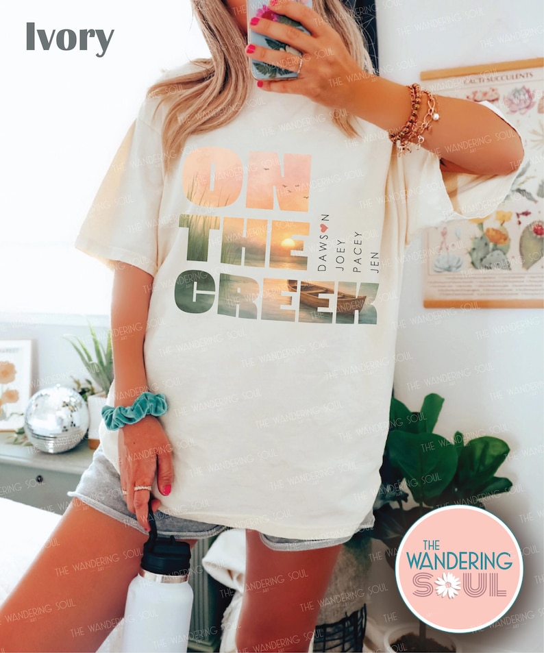 Retro Comfort Colors cream graphic tee featuring watercolor lake sunset and row boat, nostalgic millennial women vintage aesthetic shirt