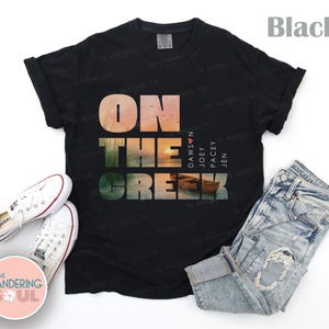 Trendy Comfort Colors cream shirt with retro sunset creek illustration, millennial aesthetic vintage graphic tee fashion. Dawson's Creek