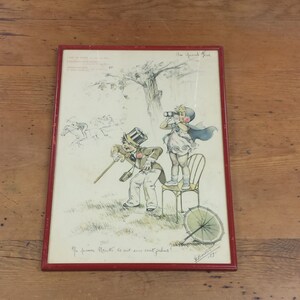 May include: A vintage framed illustration of two children watching a horse race. The girl is standing on a chair and holding binoculars. The boy is standing next to her with a cane and a top hat. The text in the image reads "La fortune Nouvelle est tout sans piedrus!"