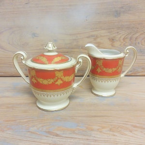 Noritake N3997 Sucrier et crémier Porcelaine Chine Citrouille orange brûlé Swags en or vers 1930