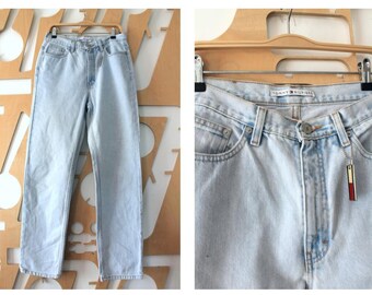 designer jeans with crosses on them