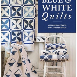 May include: An image showcasing blue and white quilts with diverse patterns, including floral and geometric designs. Some quilts are folded and stacked on a white chair. The image also shows a quilt with a basket design and the text "BLUE & WHITE Quilts".