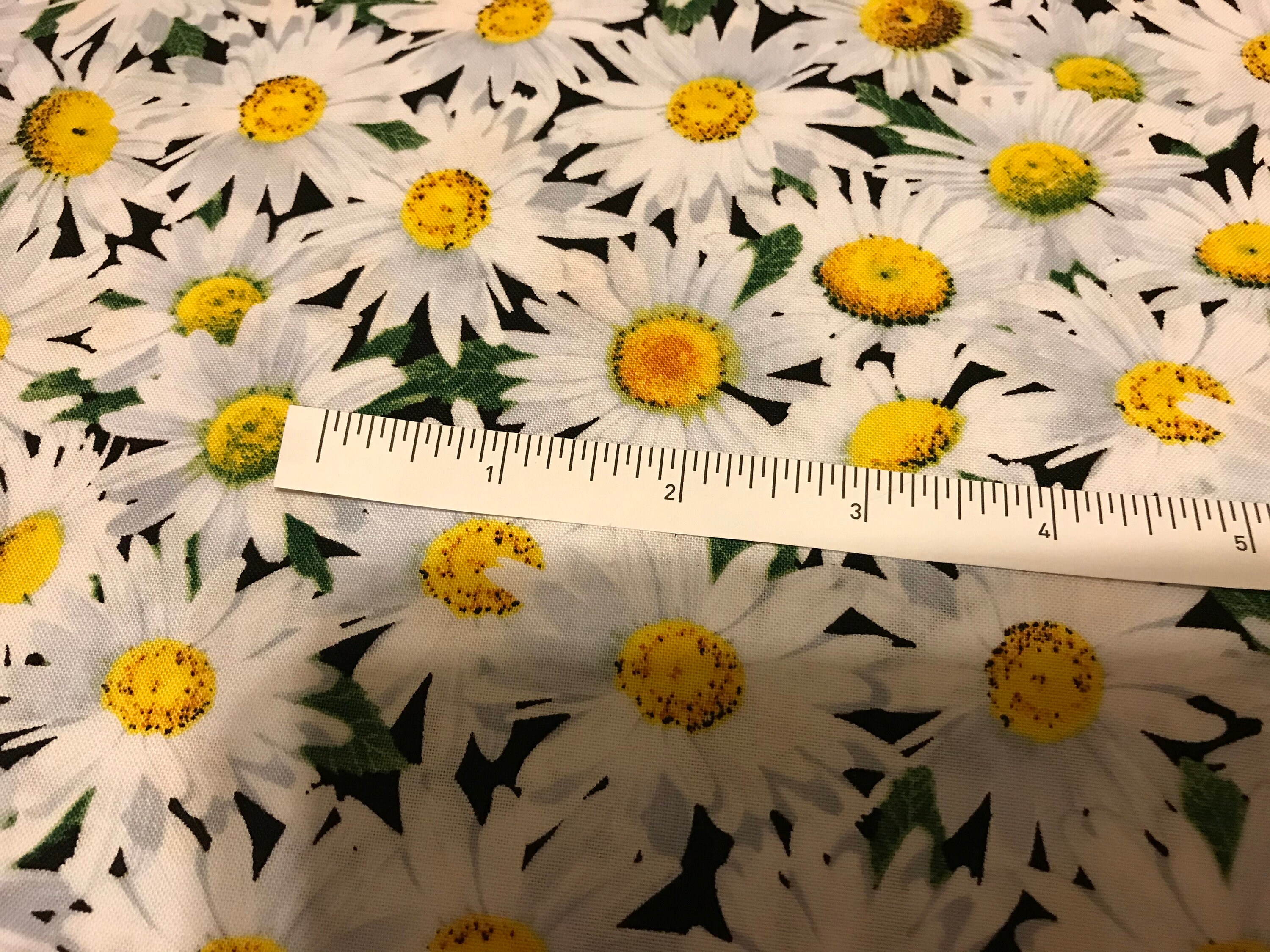 White packed Daisy 100 cotton fabric, sold by the yard