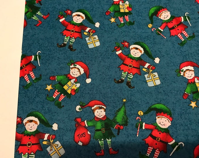 Elves on Blue 100%cotton fabric, sold by the yard