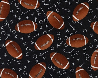 Tossed Footballs  100% cotton fabric, sold by the yard #511