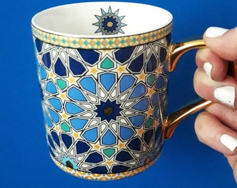 Moroccan style ceramic cup set with tea, golden spoon, date cookie, blue or red color with golden handle and inner printing