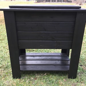 Stained wood cooler stand with bottom shelf