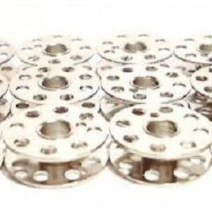 May include: A set of 12 silver metal bobbins for sewing machines.