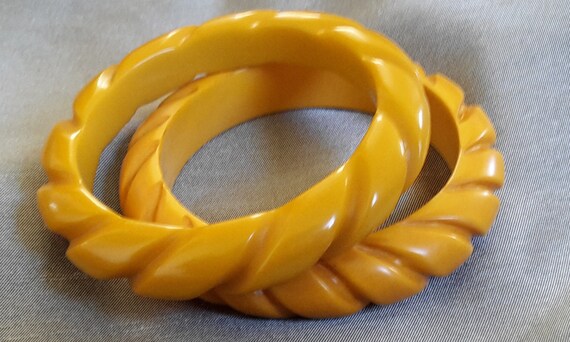 Vintage Bustterscotch Bakelite Bracelets carved sp