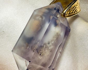Handcrafted glow pendant. Unique floating, light-catching shine.  Real gold chain.  Limited holiday pieces.