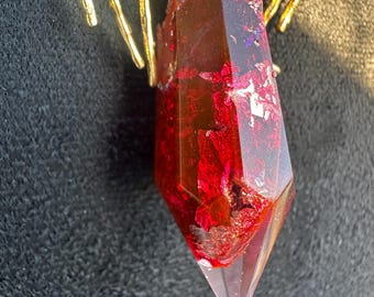 Handcrafted glow pendant. Unique floating, light-catching shine.  Real gold chain.  Limited holiday pieces.