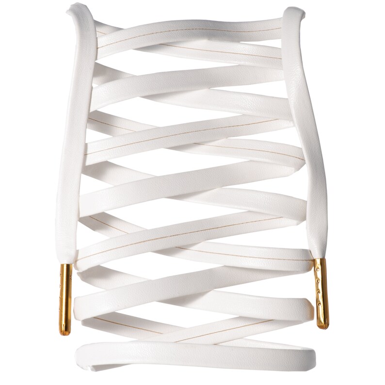 May include: White leather shoelaces with gold metal aglets, woven in a criss-cross pattern.