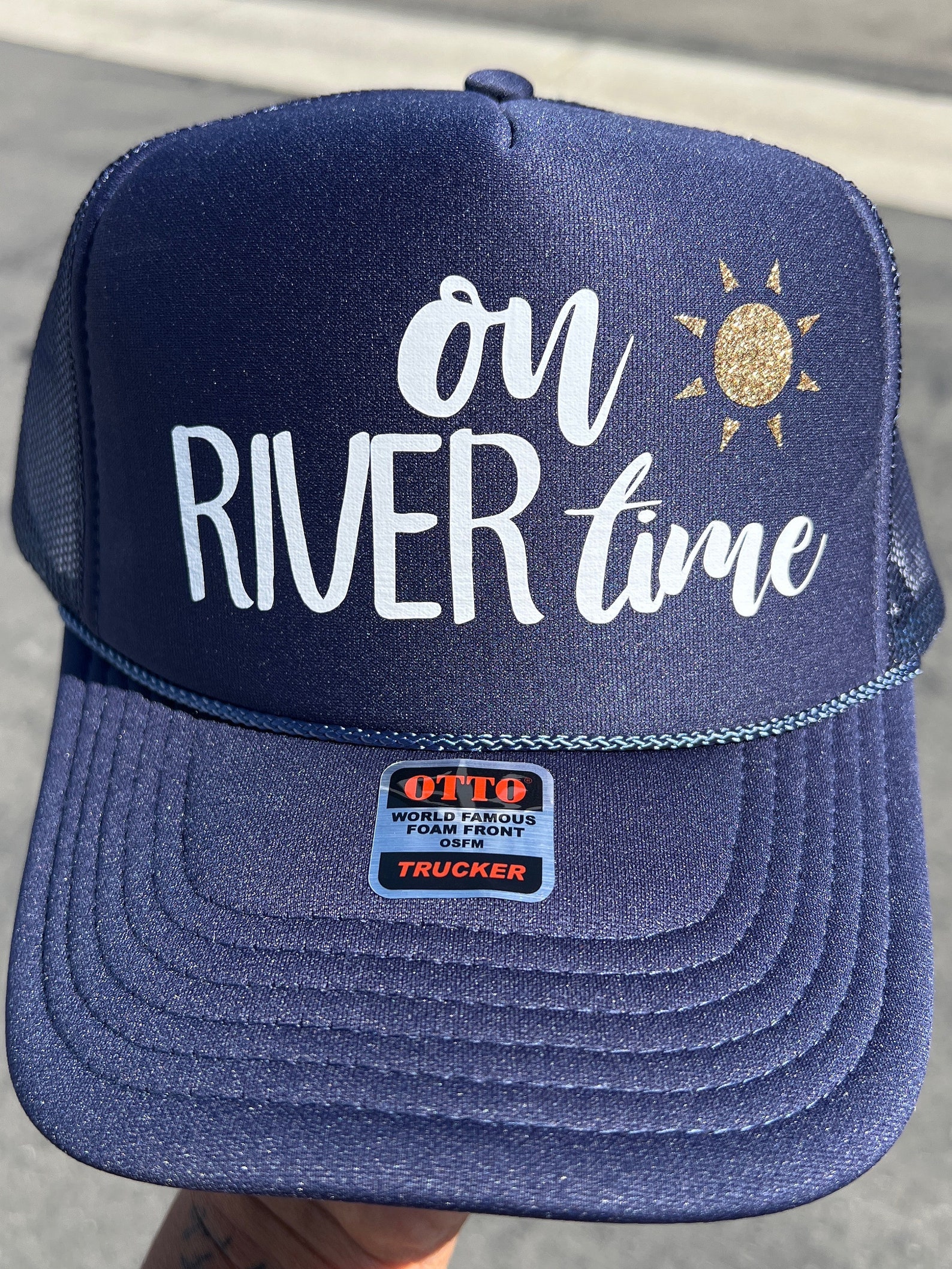 The White Drink On The River Trucker Hat main image 0
