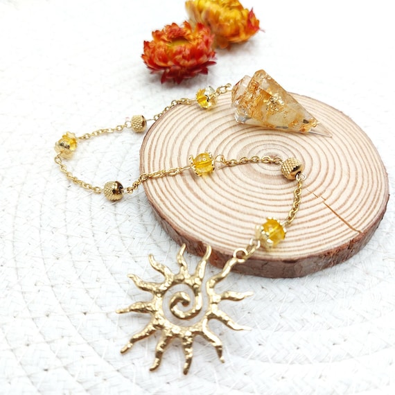 Pendule divinatoire soleil citrine feuilles dorées