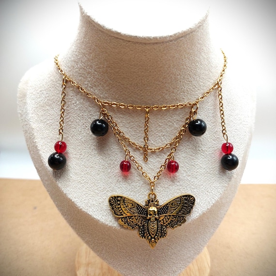 Collier Ras de cou gothique Papillon de nuit tête de mort