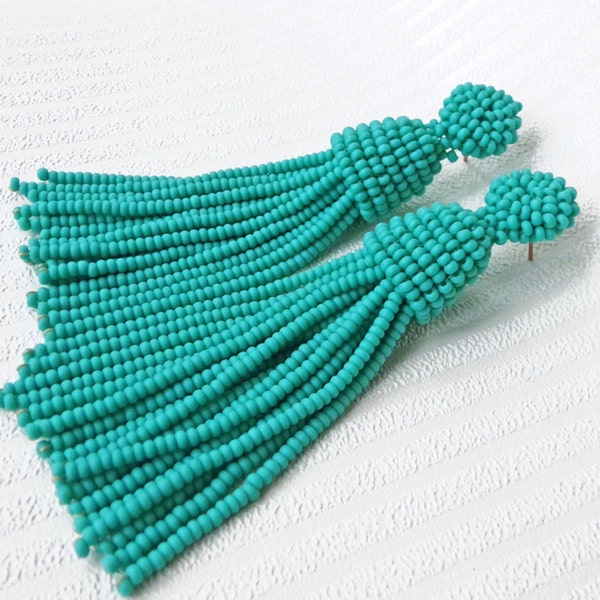 Matte turquoise statement beaded tassel stud earrings in Oscar de La Renta style. Fashion and lightweight turquoise tassel earrings.