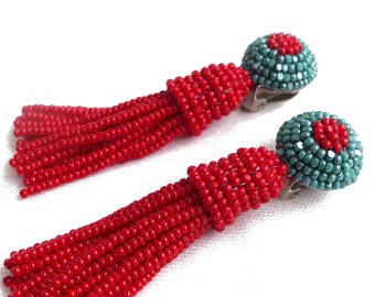 Red statement beaded tassel earrings in Oscar de La Renta style. Red turquoise clip on Charlotte Seed Beads earrings in handmade