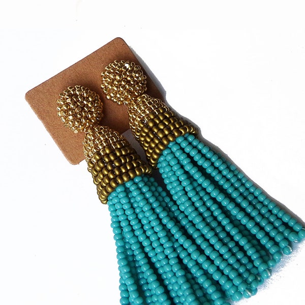 Turquoise, gold beaded tassel earrings in Oscar de la Renta style. Lightweight fashion dangle drop multicolored stud earrings.