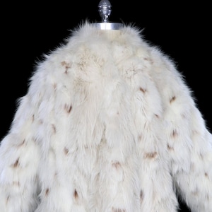 Oscar de la Renta fox jacket, fur winter coat white ivory brown black spots animal print Dalmatian snow leopard Mongolian Tibetan lamb style