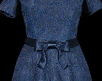 Oleg Cassini dress 1950s 1960s midnight blue lace, New Look style, satin bow waist hem, Cassini's rare Jacquie Kennedy Camelot era couture