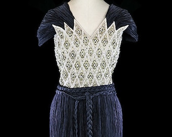 Mary McFadden Couture evening gown, heavily beaded grecian goddess black plisse dress, Fortuny Miyake style pleats, gold ivory pearl