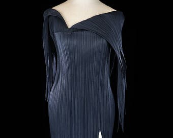 Iconic Issey Miyake dress, Morticia Addams style black avant garde pleated gown Japanese couture origami Fortuny pleats goth gothic fringe