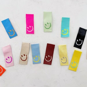 Happy face Labels, embroidered, cotton, logo, sewing, craft, neckband, side flag, tags, sew in tags, brand label, neckline, side seam