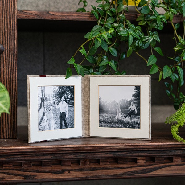 Matted linen photo display with magnetic closure for 4x4" photos, bi-fold wedding gift