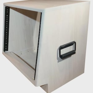 May include: A light-colored wooden rack enclosure featuring a slanted front profile. The unit includes black metal vertical mounting rails with pre-drilled holes and a single black rectangular handle attached to the side panel for portability.