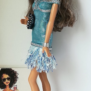 Complete doll with fashions