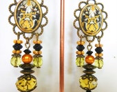 Baroque earrings quot arabesques quot cabochon glass illustrated 18th, bronze metal, Bohemian glass faceted yellow green, opaque black glass