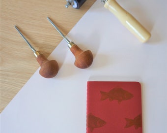 Moleskine goldfish notebook 9 x 14 cm linocut red cover