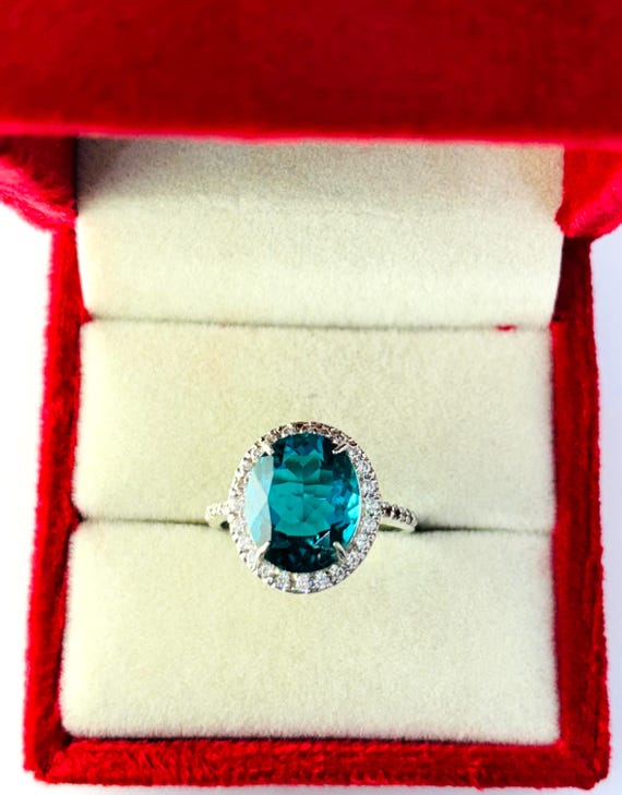 Oval Paraiba Tourmaline Lab Grown Ring, Sterling Silver, Zircon Accents