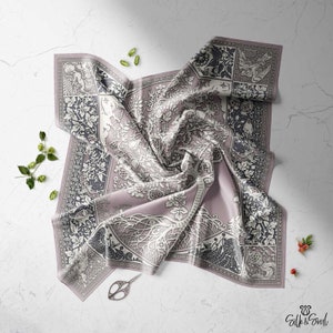 100 percent silk scarf adorned with a tree of life and nature elements.  This beautiful accessory is perfect for any occasion