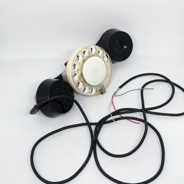 Vintage handset with dialer. Old telephone receiver