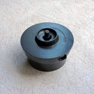 Developing tank for 35 mm film. Film developing reservoir