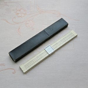 Vintage logarithmic ruler (#2). Collectible logarithmic engineering ruler. Calculating ruler