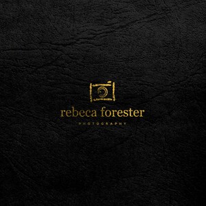 May include: A gold logo on a black background. The logo features a stylized camera icon and the text "rebeca forester PHOTOGRAPHY".