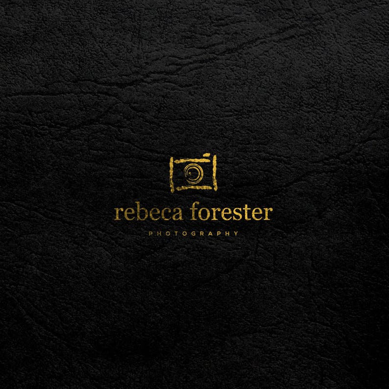 May include: A gold logo on a black background. The logo features a stylized camera icon and the text "rebeca forester PHOTOGRAPHY".