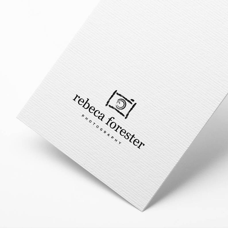 May include: Black and white logo for rebecca forester photography featuring a stylized camera icon.