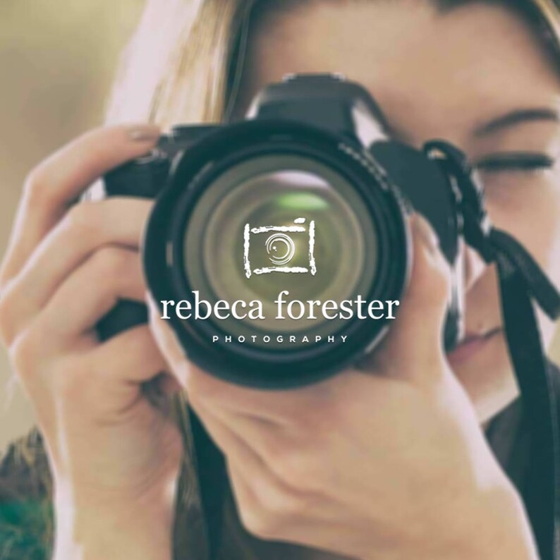 May include: A woman holding a black camera with a lens that has a white logo that says "rebeca forester photography" and a stylized camera icon.