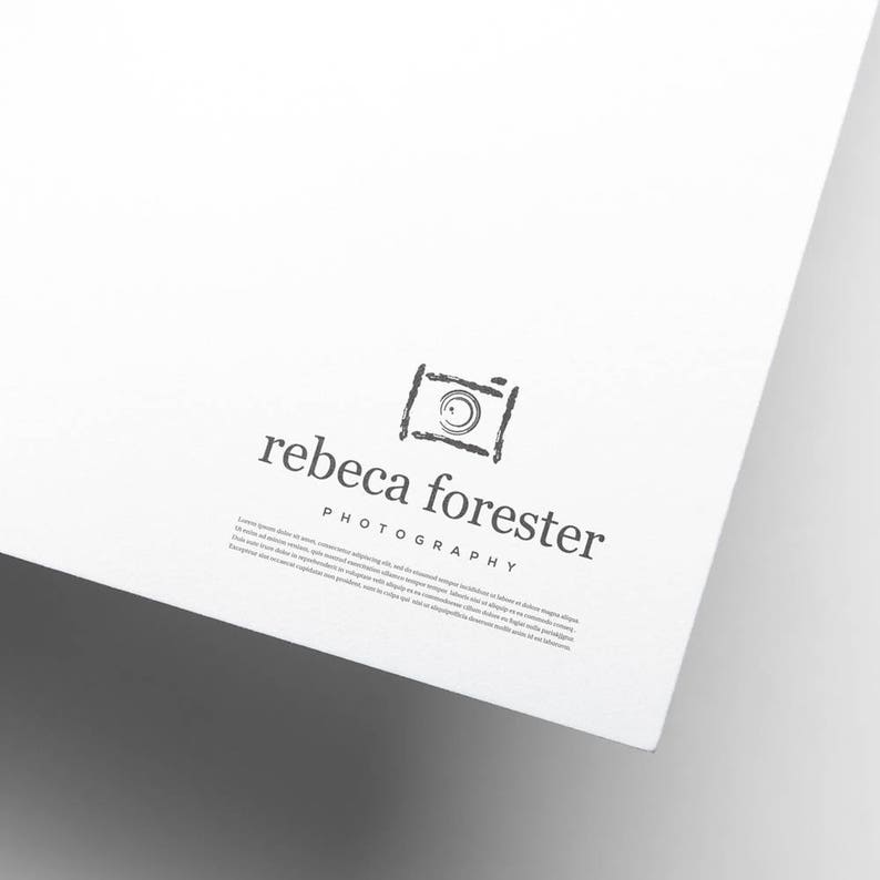 May include: A black and white logo for a photography business called "rebeca forester photography". The logo features a stylized camera icon.